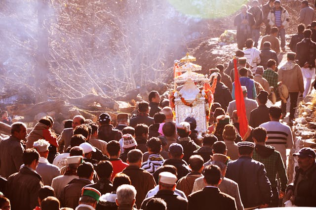 People Attending a Procession